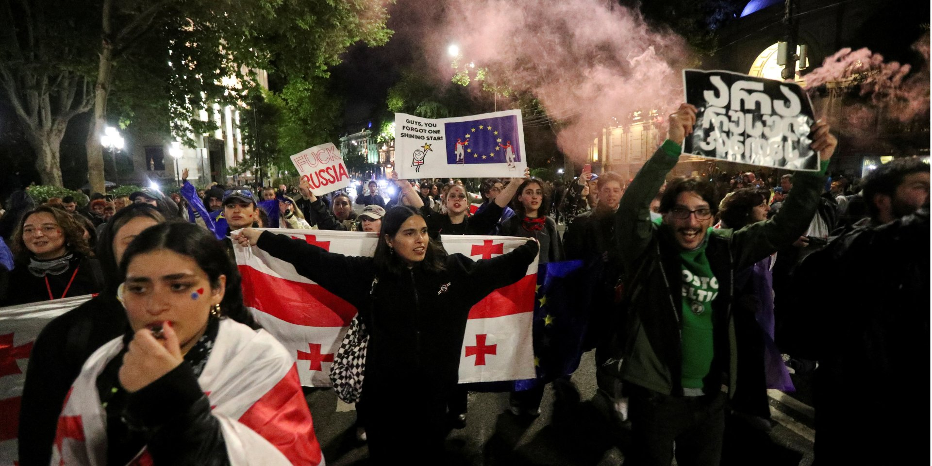 Demonstrators hold a rally to protest against the draft law on 