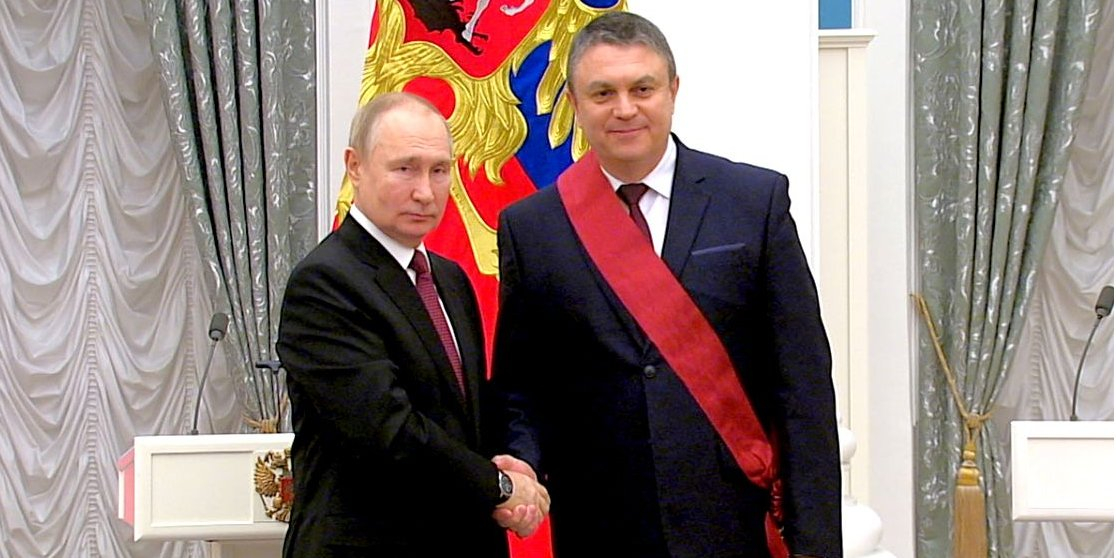 Russian dictator Vladimir Putin and his LPR's puppet Leonid Pasichnyk (Photo: Donbas,Realii video screenshot)