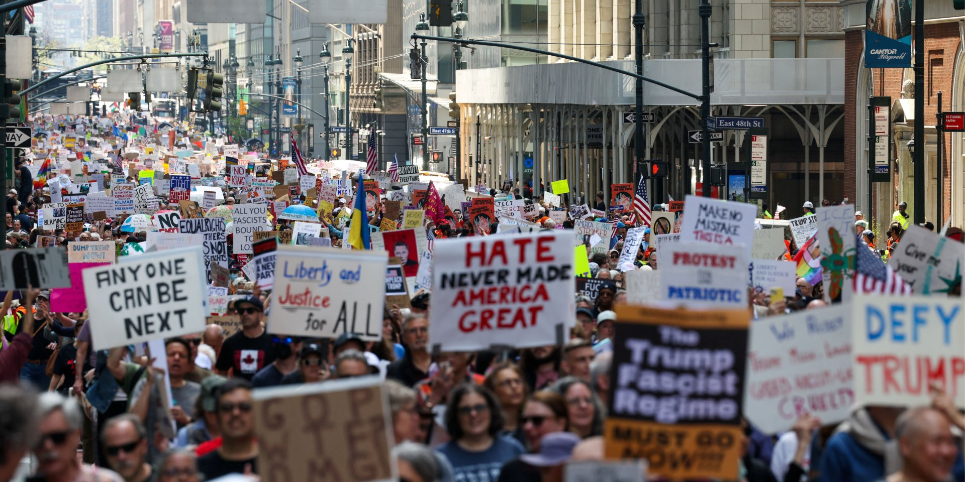 People march during the “Protect Migrants, Protect the Planet” rally in New York City, United States. (Photo: REUTERS/Caitlin Ochs)