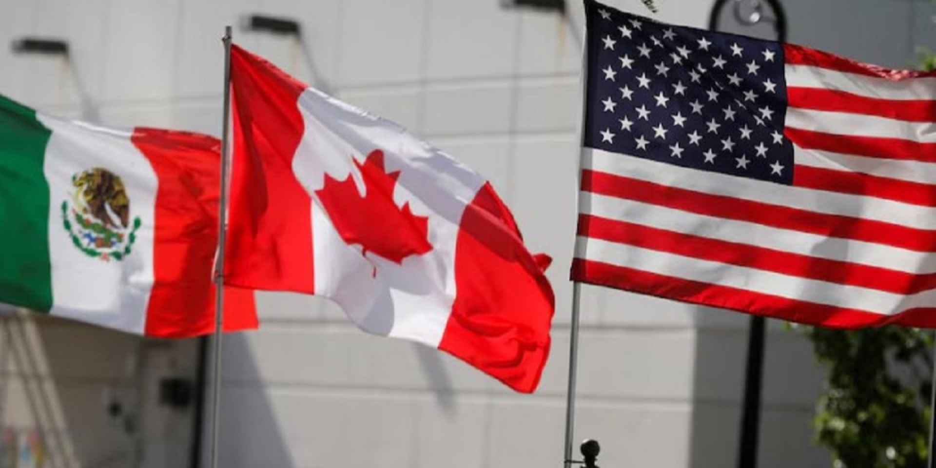 U.S., Canadian and Mexican flags (Photo: REUTERS/Rebecca Cook/File Photo)