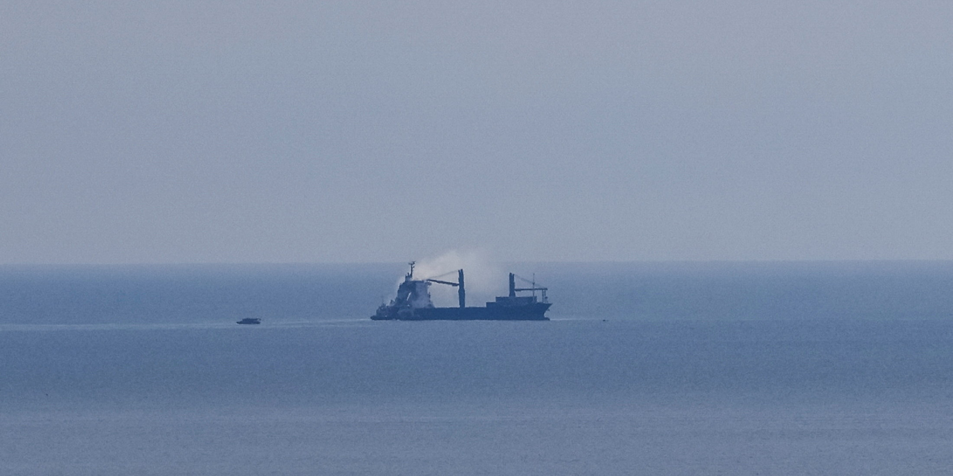 A civilian ship is on fire in the Black Sea following a Russian drone attack, July 14, 2026 (Photo: REUTERS/Nina Liashonok)