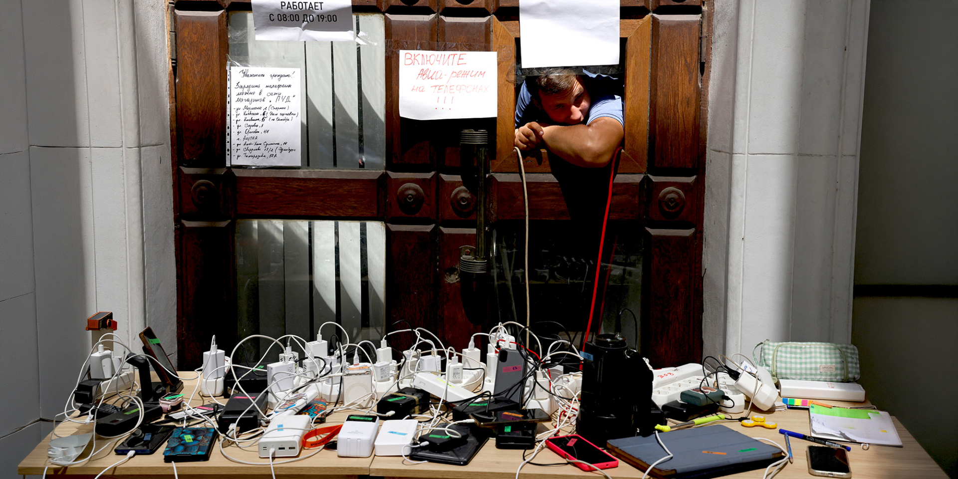 A charging station for phones and power banks during prolonged power outages in occupied Yalta. (Photo: Reuters)