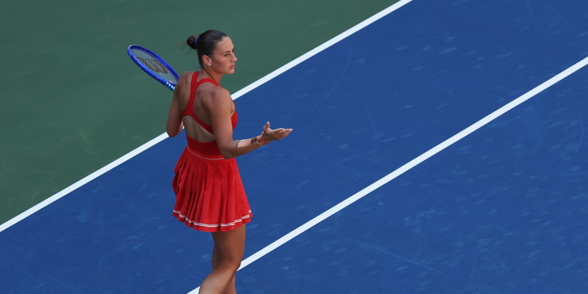 Marta Kostyuk at her match with world No. 6 Linda Noskova (Photo: Reuters/Geoff Burke)